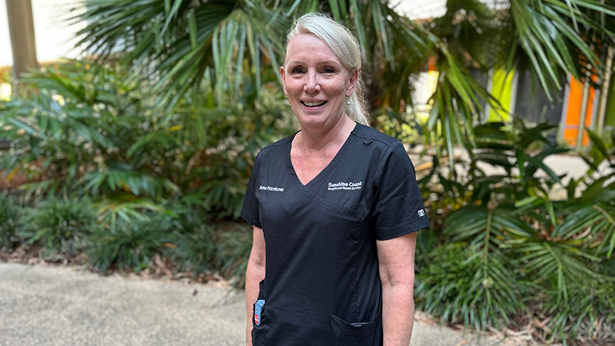 Urology Nurse Practitioner Erin McIntosh standing outside the hospital