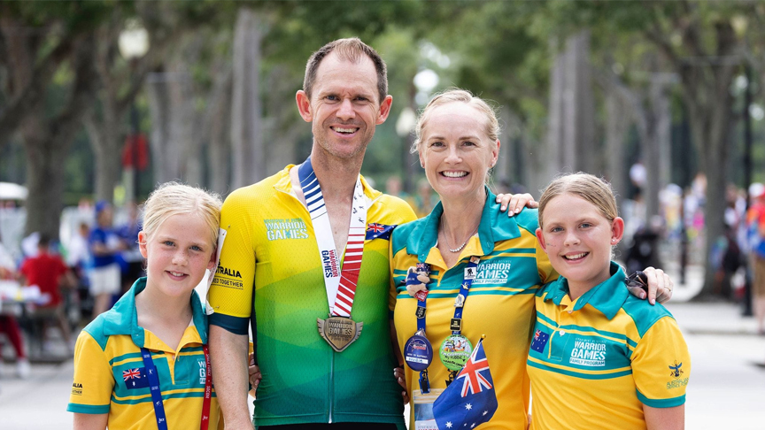 Adam Jackson with his family at the Warrior Games in June 2024