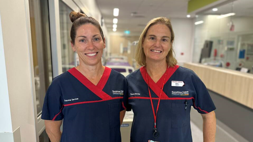 Sunshine Coast Health Trauma Service Clinical Nurse Consultant Alex Ensor and Clinical Nurse Mel Procter standing in a hallway at Sunshine Coast University Hospital